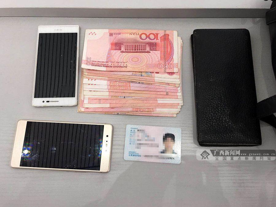 图为2月5日1名旅客遗落的2千元现金,手机等.